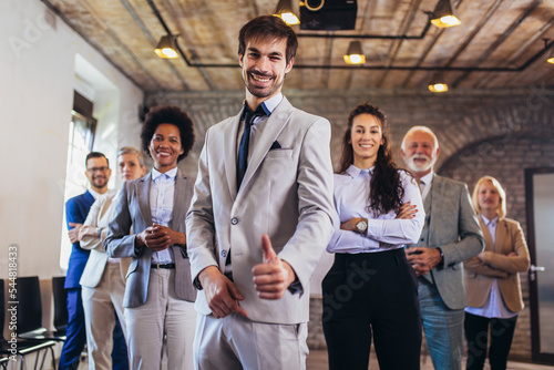 Group of business people with businessman leader on foreground