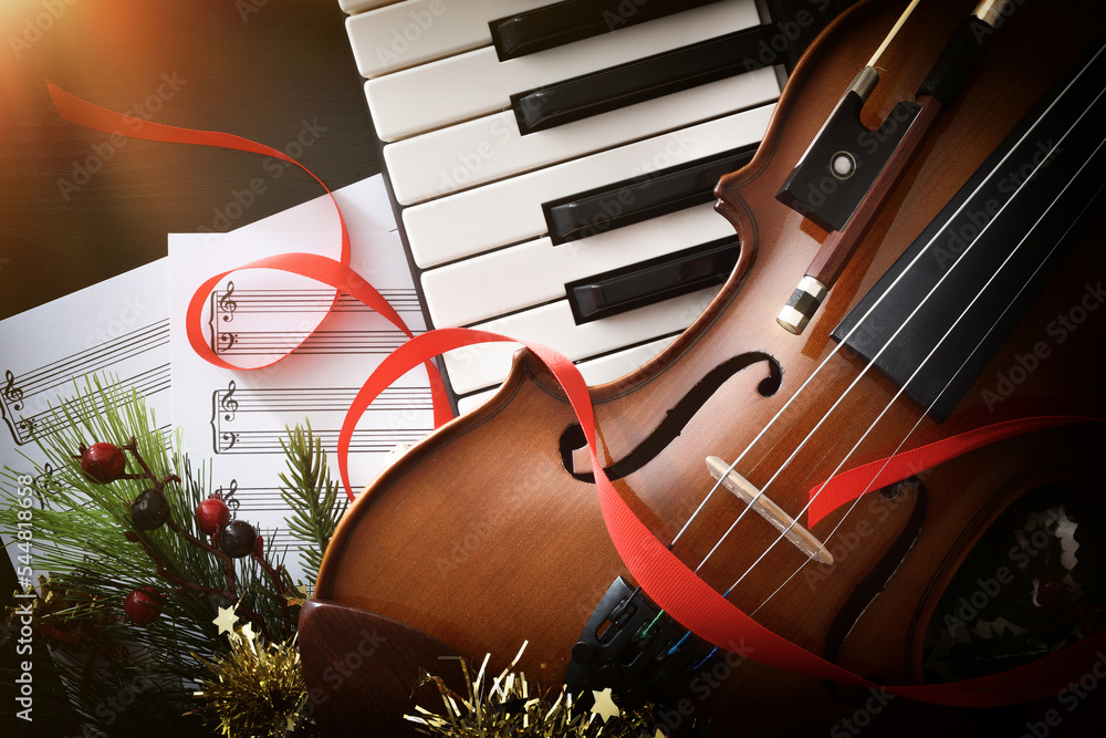 Christmas musical event with piano and violin close up Stock Photo | Adobe  Stock
