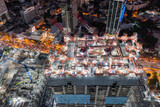 aerial view of construction site with tower crane urban construction Rush hour of concrete pouring