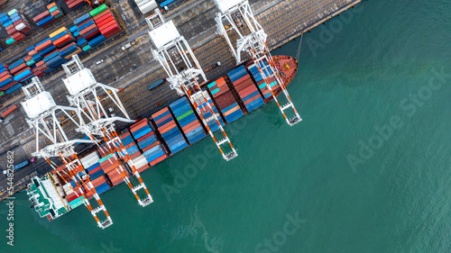 Aerial view container cargo ship global business logistic transportation import export container box, Container cargo ship boat freight shipping maritime commercial port, Cargo vessel industrial port.