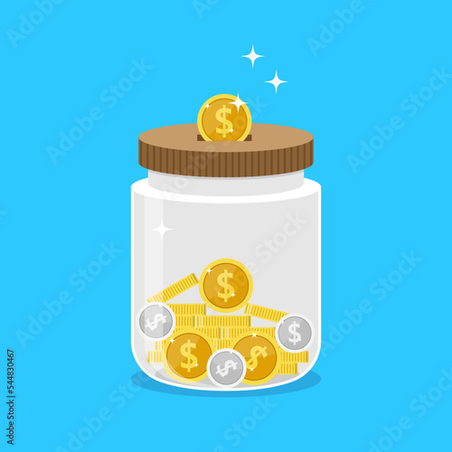 Money box glass jar filled with gold coins cash. Save money