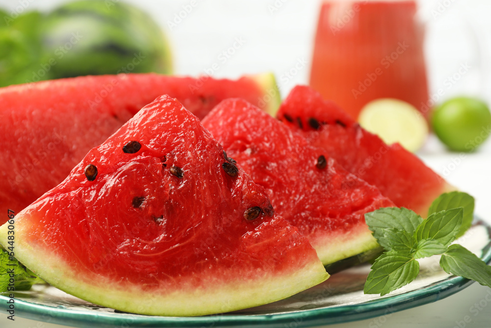 Slices of juicy watermelon on plate, closeup Slices of juicy watermelon on plate, closeup