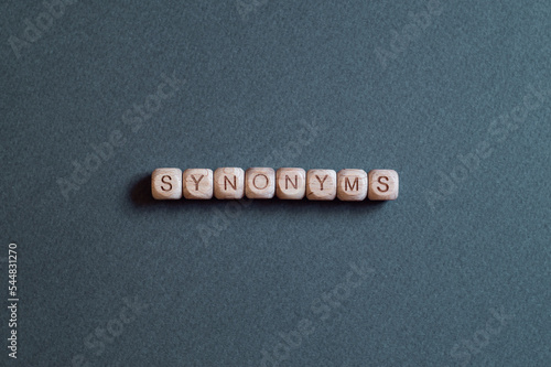 Synonyms - word concept on cubes