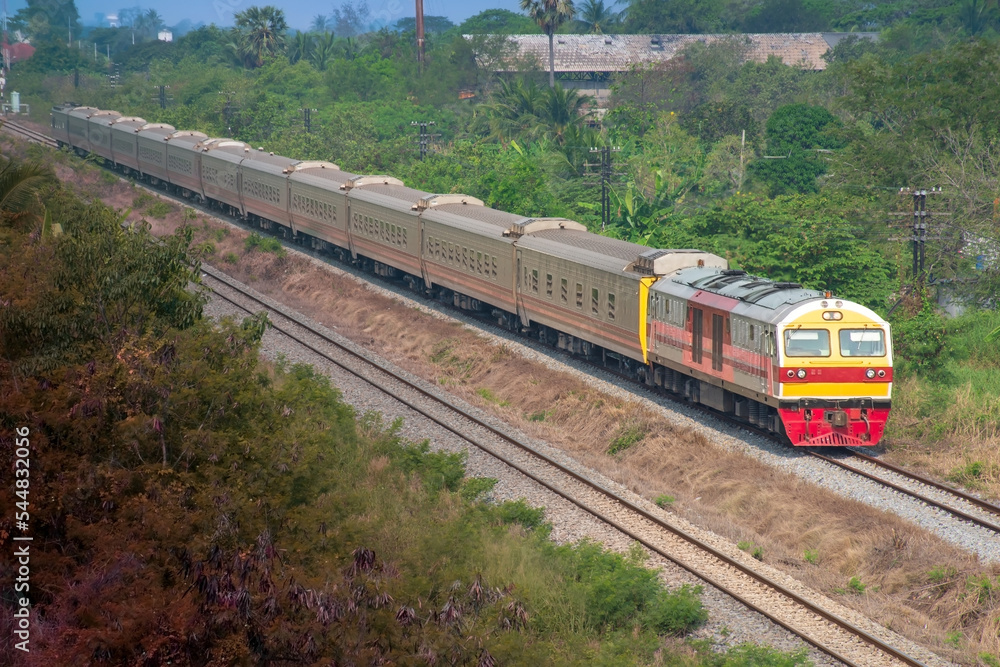 Passenger train by diesel locomotive on the railway. Passenger train by diesel locomotive on the railway.