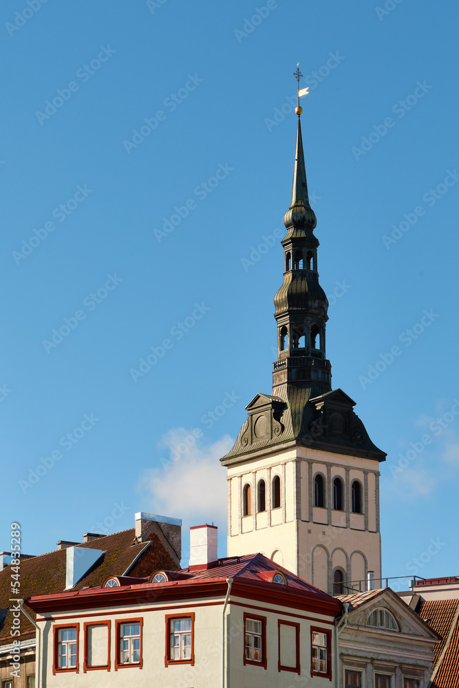 Steeple of St. Nicholas Church in Tallinn, Estonia on a sunny summer day