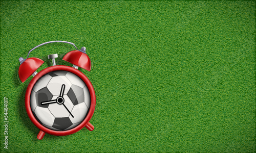 Ringing alarm clock on the football field