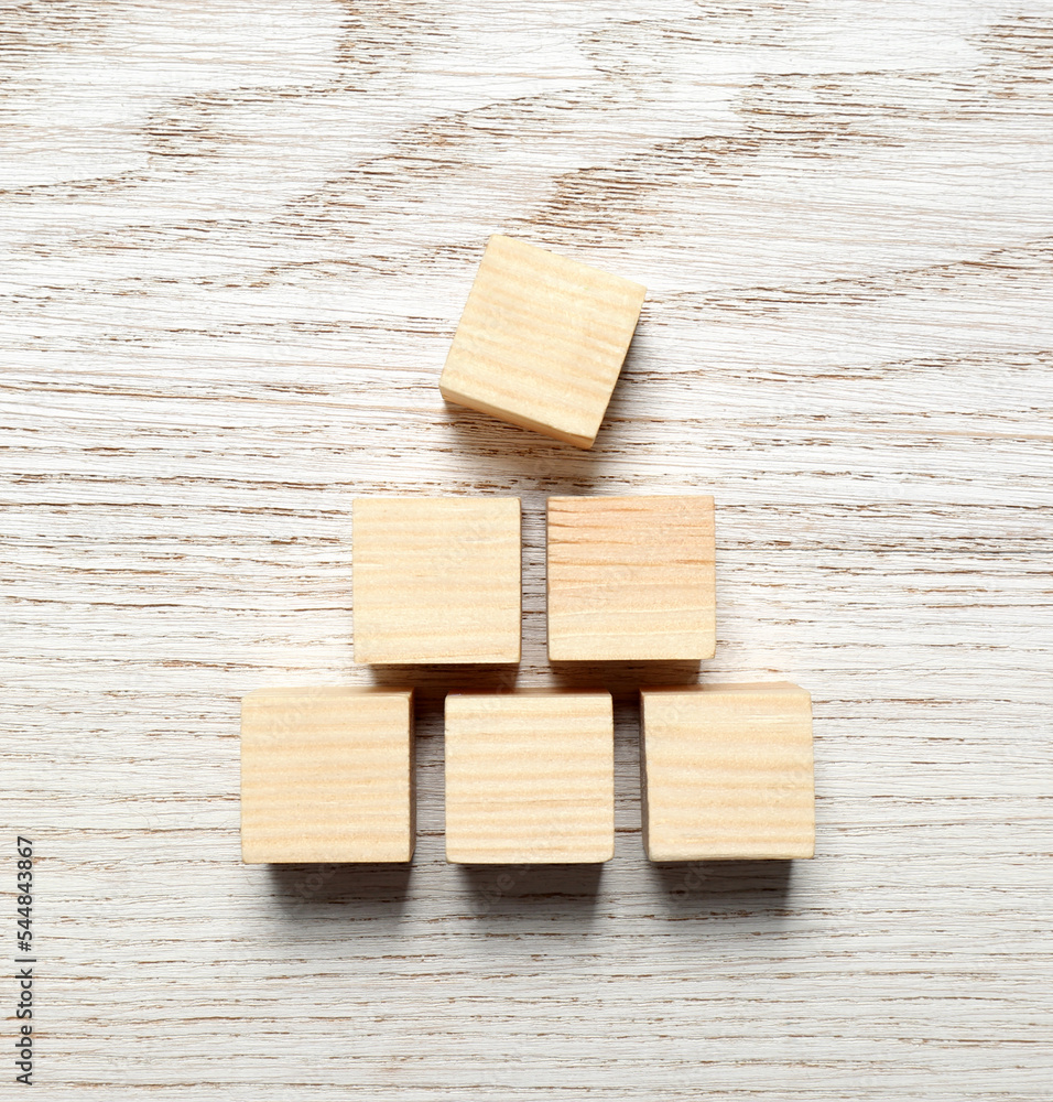 Blank cubes on white wooden table, flat lay with space for text. Idea concept Blank cubes on white wooden table, flat lay with space for text. Idea concept
