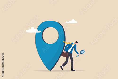 Location search for business address, map or direction to navigate or find position, office location street information concept, curious businessman search with magnifying glass with map location pin.