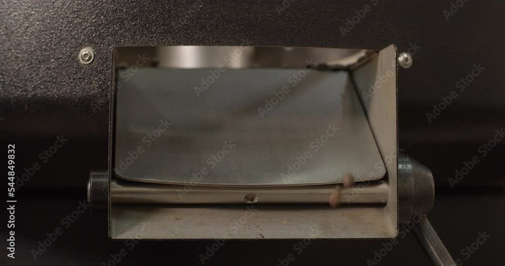 Coffee beans after roasting are poured into the machine for cooling. Coffee beans after roasting are poured into the machine for cooling.