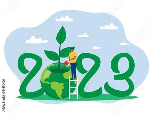 2023 Happy Young man water the planet Earth World Earth Day concept of conservation, protection and reasonable consumption of natural resources