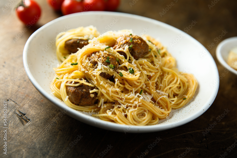 Traditional spaghetti with meatballs and tomato sauce