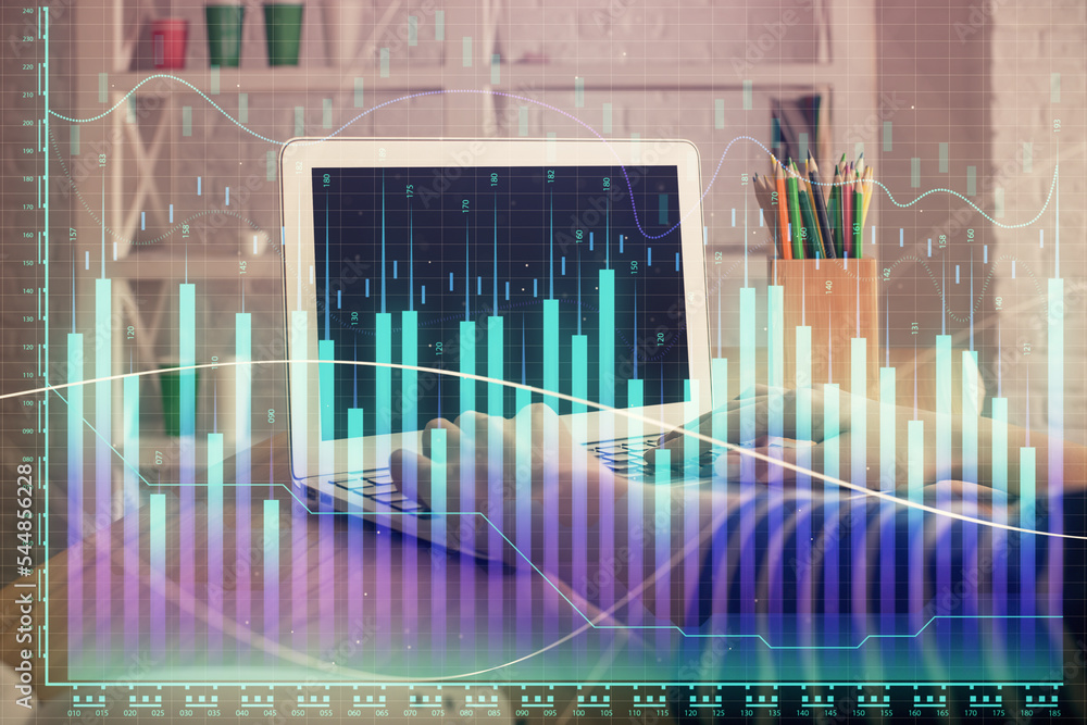 Double exposure of woman hands typing on computer and forex chart hologram drawing. Stock market invest concept. Double exposure of woman hands typing on computer and forex chart hologram drawing. Stock market invest concept.