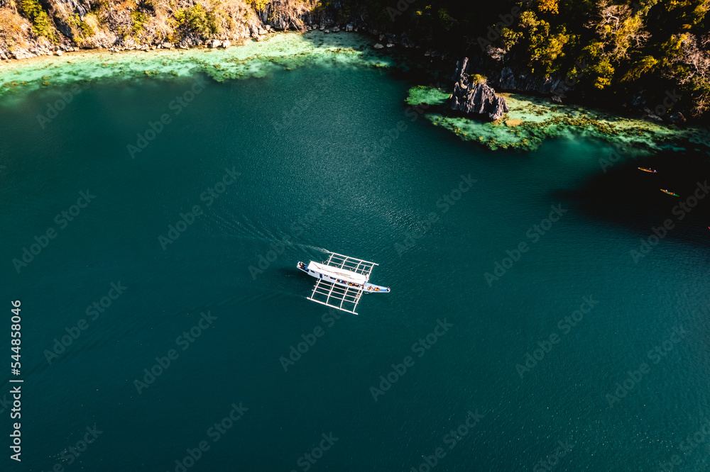Aerial view of Twin Lagoon turquoise waters with a drone The Philippines Coron 