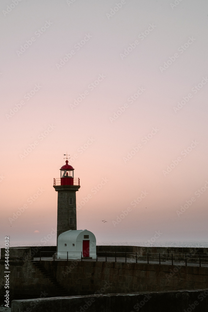A lighthouse at Atlantic ocean in Porto. Travel to Portugal 