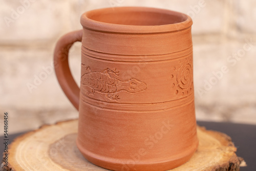 Ceramics, a ceramic product made with their own hands, made on a potter's wheel, jug, mug, clay, ornament.