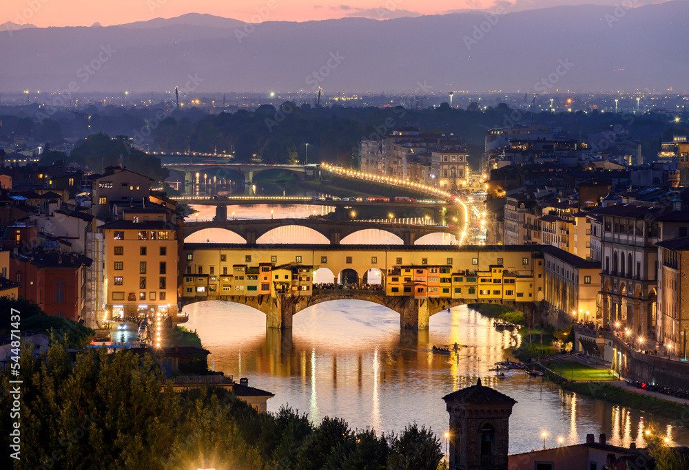 Ponte Vecchio bridge over Arno river at sunset, Florence, Italy