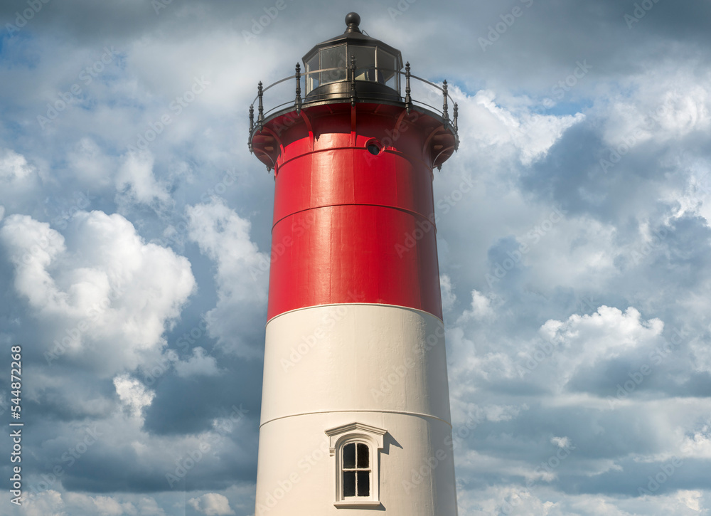 Lighthouse and summer clouds