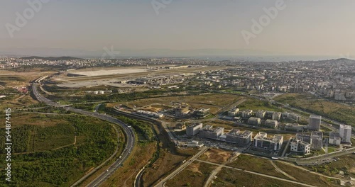 Istanbul Turkey Aerial v2 drone flyover pendik sanayi capturing sabiha gokcen international airport airfield and cityscape with sea of marmara in the background - Shot with Mavic 3 Cine - July 2022 photo