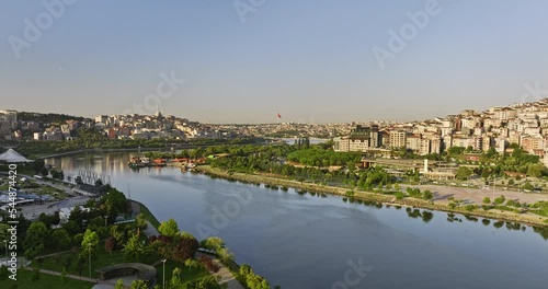 Istanbul Turkey Aerial v43 cinematic low level flyover kagithane creek leading to golden horn estuary capturing waterfront parks and urban cityscape at sunrise - Shot with Mavic 3 Cine - July 2022 photo