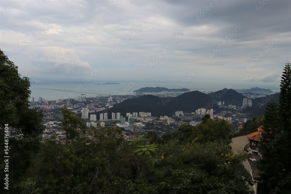 view from a mountain to an Asian city 