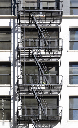 Portland, OR, USA - Oct 16, 2022: View of the apartment building with a fire escape staircase. Fire escapes on the facades of houses in Portland. Streets and architecture of Portland.