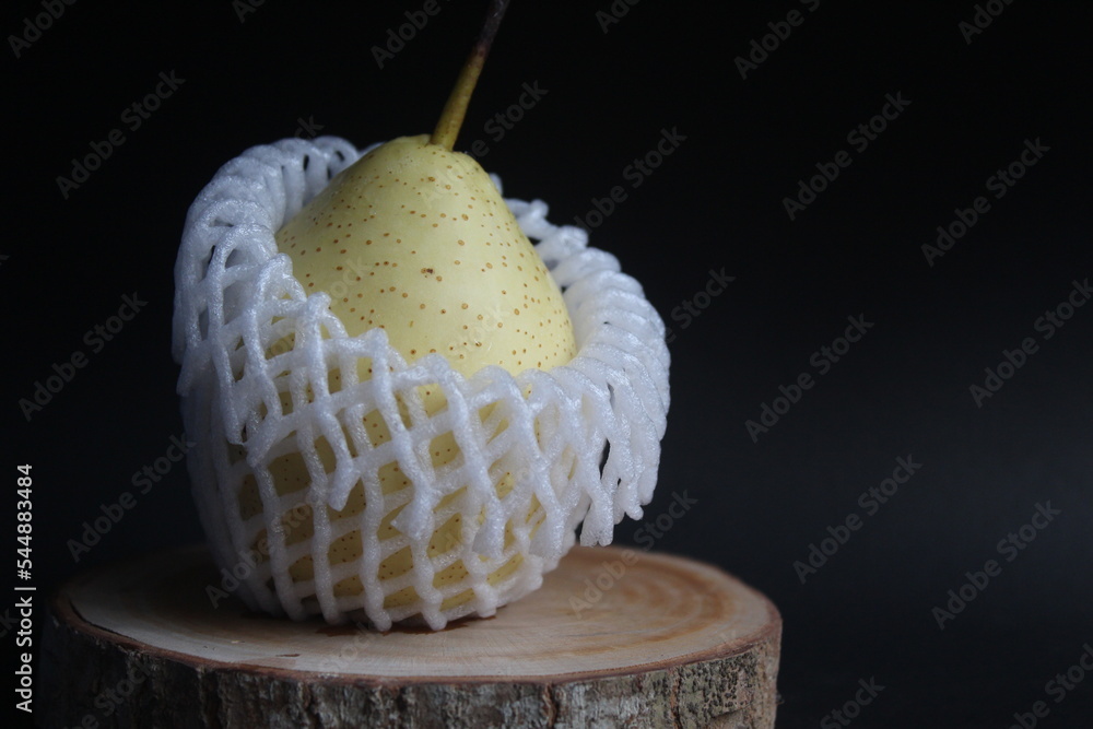 pears on the table on a black background