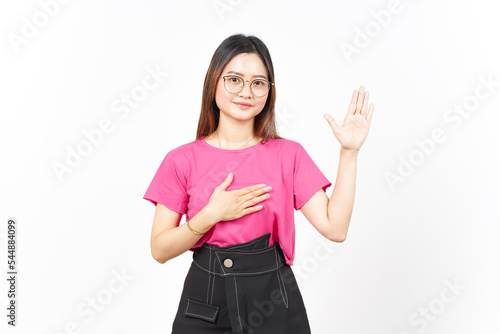 Swearing gesture Of Beautiful Asian Woman Isolated On White Background photo