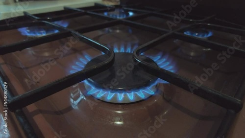 blue natural gas burns gas stove on all burners ecology energy crisis concept. High quality 4k footage