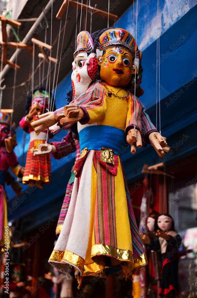 Souvenirs and gifts toys puppets image deity style and figure marionette demon in local hawker grocery store shop for nepali people and travelers visit select buy at thamel old town in Kathmandu Nepal