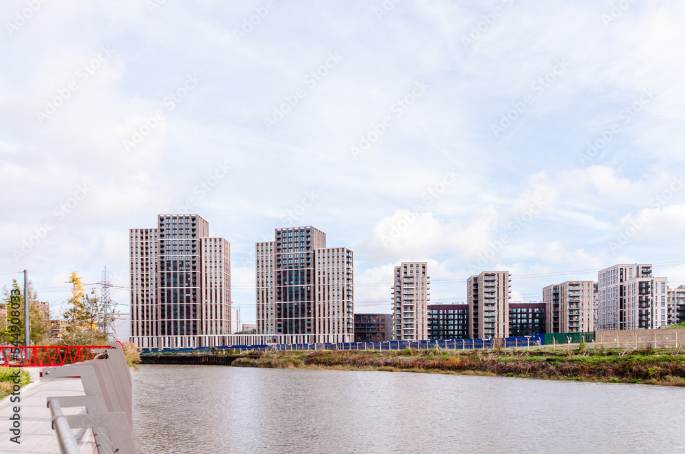 london, united kingdom, october 22, 2022: canning town residential development on the river lea at canning town, london - obrazy, fototapety, plakaty 