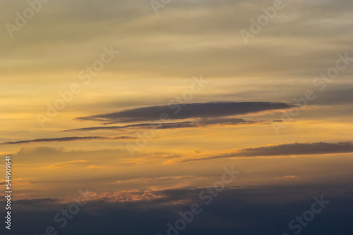 sunset sky with multicolor clouds. Dramatic twilight sky background