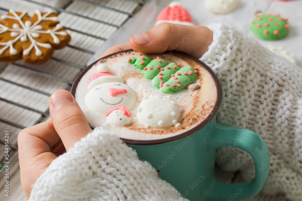 Christmas hot chocolate with snowman marshmallow in the cup Christmas hot chocolate with snowman marshmallow in the cup