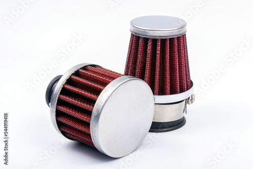 Conical chrome air filters with - tuning accessory on a white background