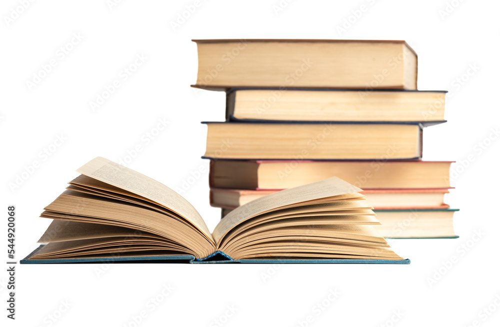 An open hardcover book and a stack of books on a white background. An open hardcover book and a stack of books on a white background.