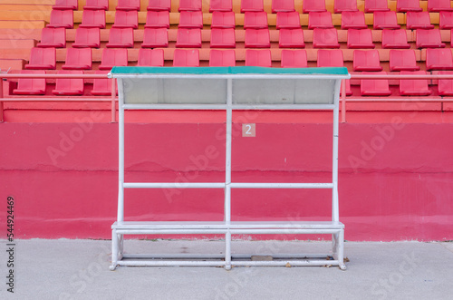 Reserve chair and staff coach bench in sport stadium photo