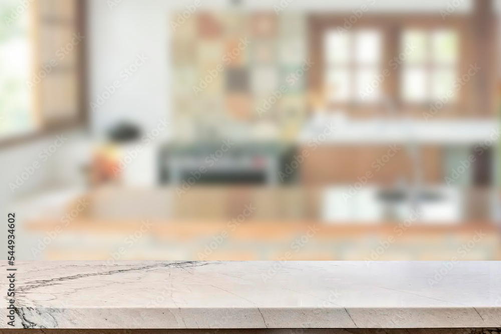 Empty marble top table with blurred kitchen interior Background. for product display.
Empty marble top table with blurred kitchen interior Background. for product display.