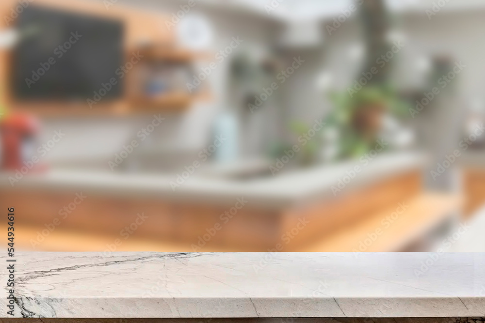 Empty marble top table with blurred kitchen interior Background. for product display.
