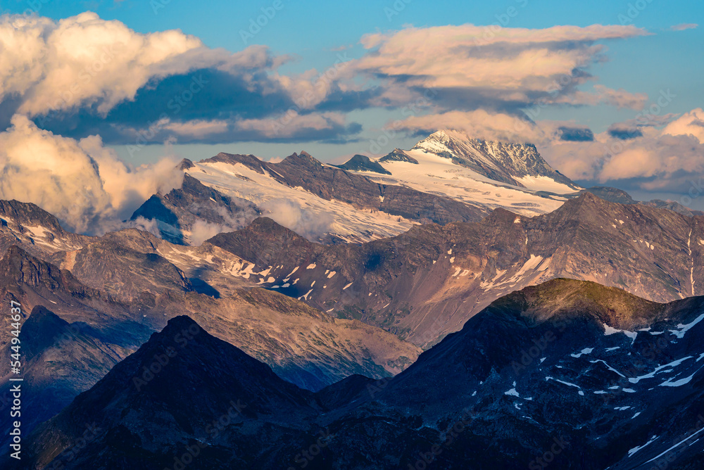 Dramatic clouds above the Glockner Group of the Hohe Tauern range in Austrian alps.