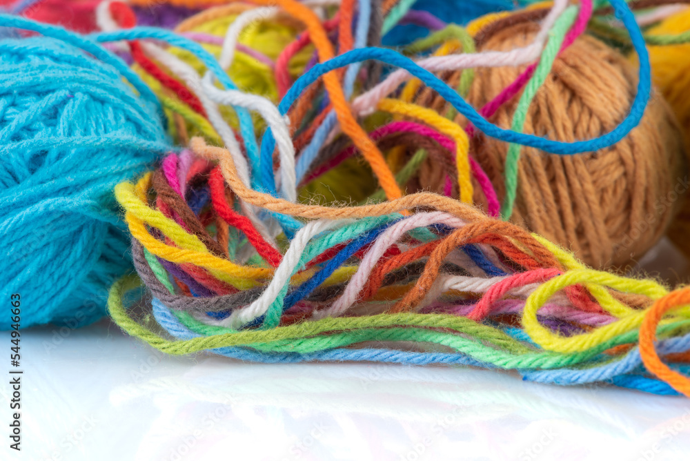 Colorful woolen yarn balls close-up