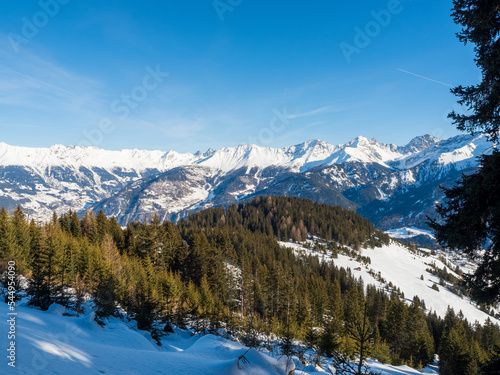 Panoramic view with forest in winter in resort Ladis, Fiss, Serfaus in ski resort in Tyrol.
