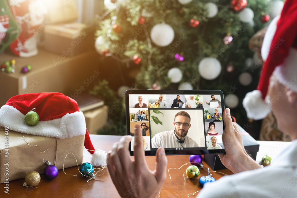Foto Stock Virtual Christmas tree meeting team teleworking. Family