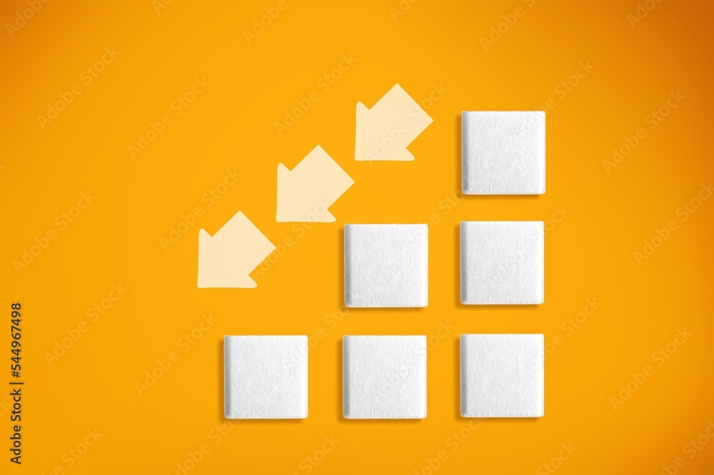 Set of sugar cubes on the desk and arrows