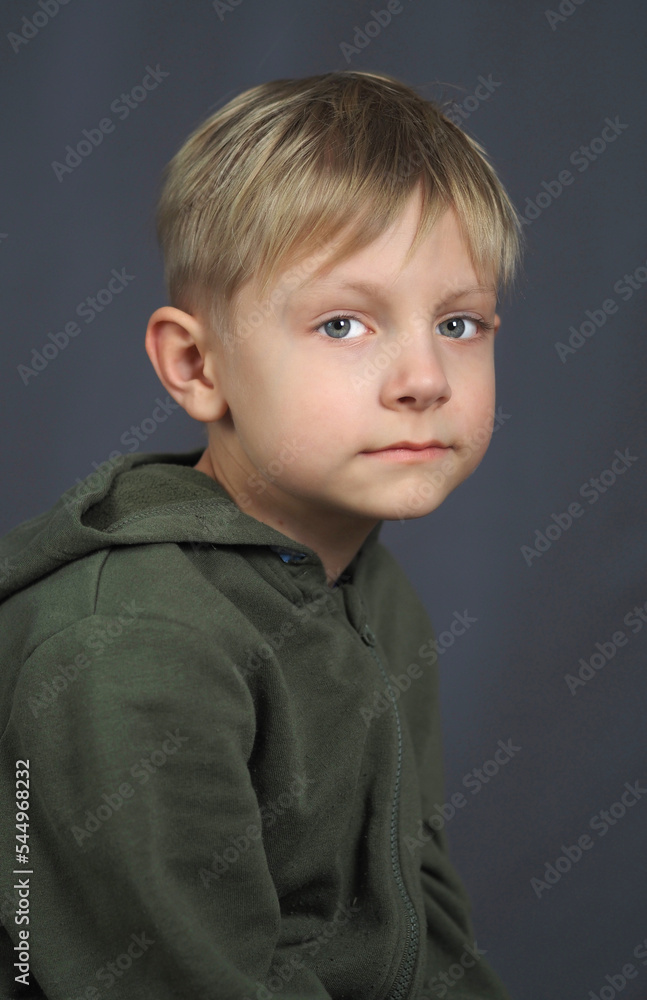 Studio portrait of a caucasian blue-eyed boy Studio portrait of a caucasian blue-eyed boy