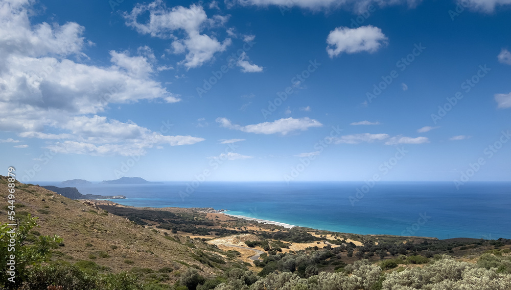 Scenic view of seascape and coastline against sky Scenic view of seascape and coastline against sky