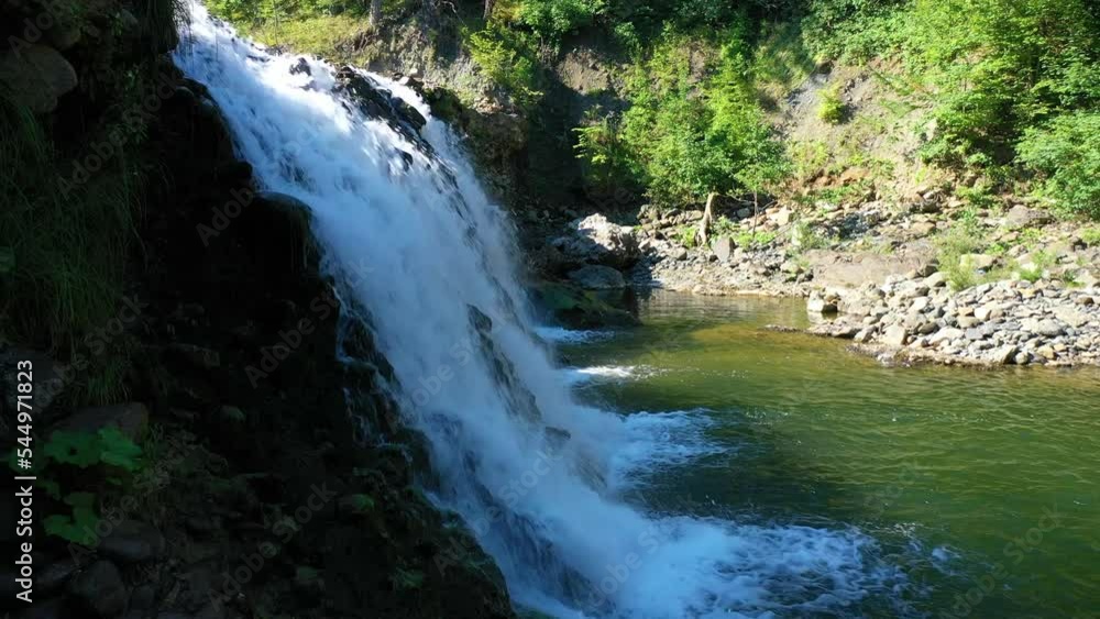 A beautiful natural waterfall on the river - 4k drone footage A beautiful natural waterfall on the river - 4k drone footage
