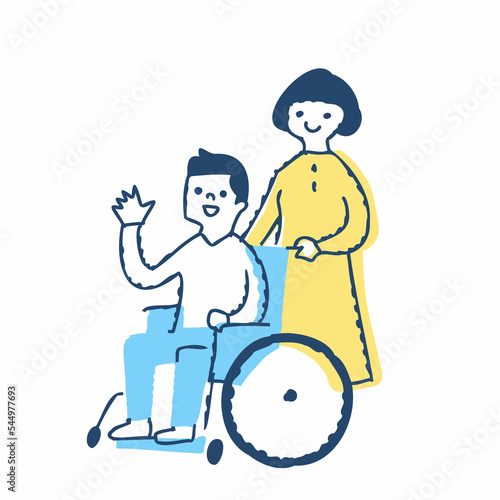 手を振る車椅子の男性と介助する女性