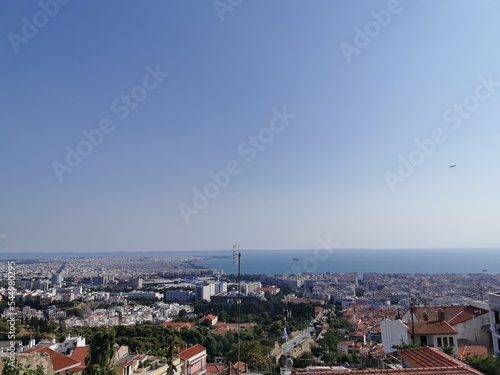  View of the city from the mountain. Greece, the city of Thessaloniki, an observation deck for tourists. Modern city and view of the mediterranean sea © Marynkka_muis