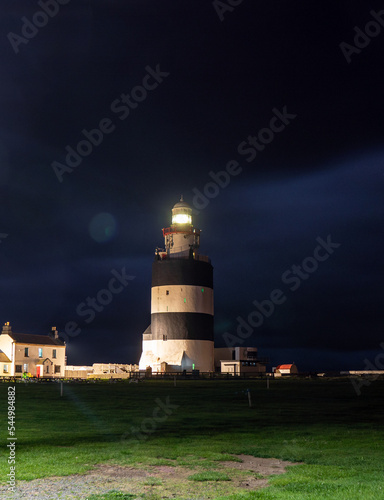 Hook Lighthouse at night. One of the oldest lighthouses in the world.