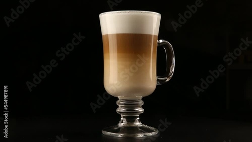 Coffee latte cappuccino in a glass. photo