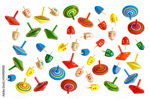 Foto Hanukkah Jewish holiday. Wooden dreidels (spinning top). PNG
